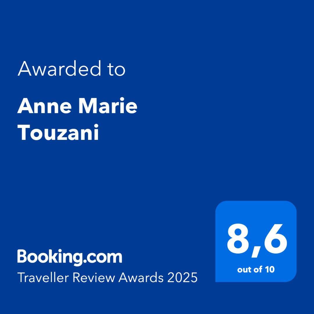 Anne Marie Touzani *